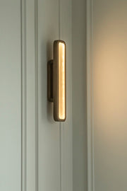 Hublot alabaster wall sconce