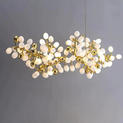 Post Modern Linear Grape Branch Chandelier Over Dining Table